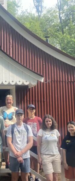 Group of Young People outside a tin hut chapel