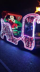 Santa in his illuminated sleigh