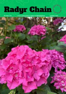 Cover of Chain 276 featuring photo of pink flowers